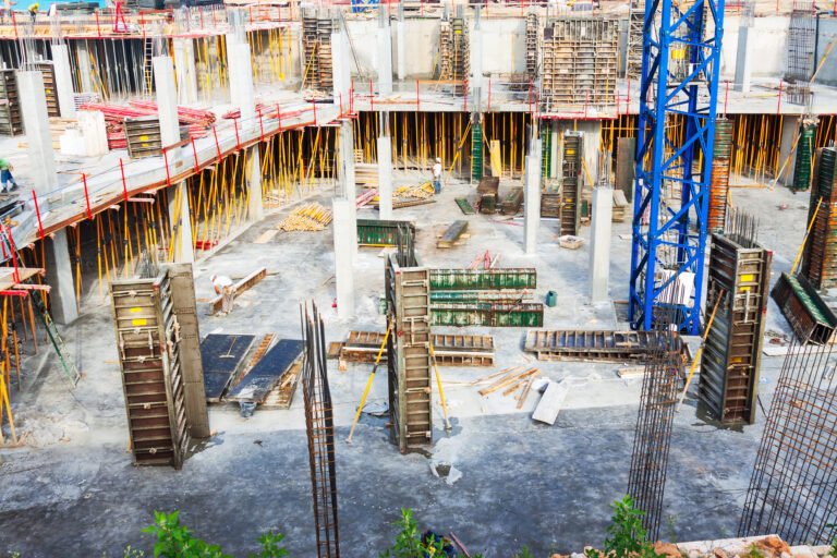 View of construction work site. Building new concrete house